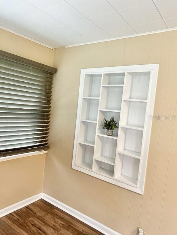 empty room featuring dark hardwood / wood-style floors