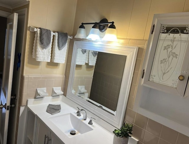 bathroom with vanity and backsplash