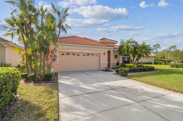 mediterranean / spanish-style house with a garage and a front lawn