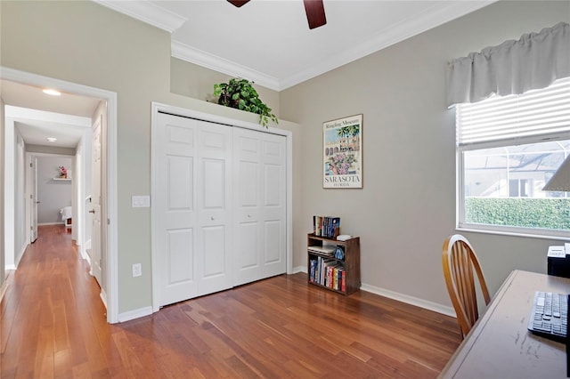 office area featuring crown molding, hardwood / wood-style floors, and ceiling fan