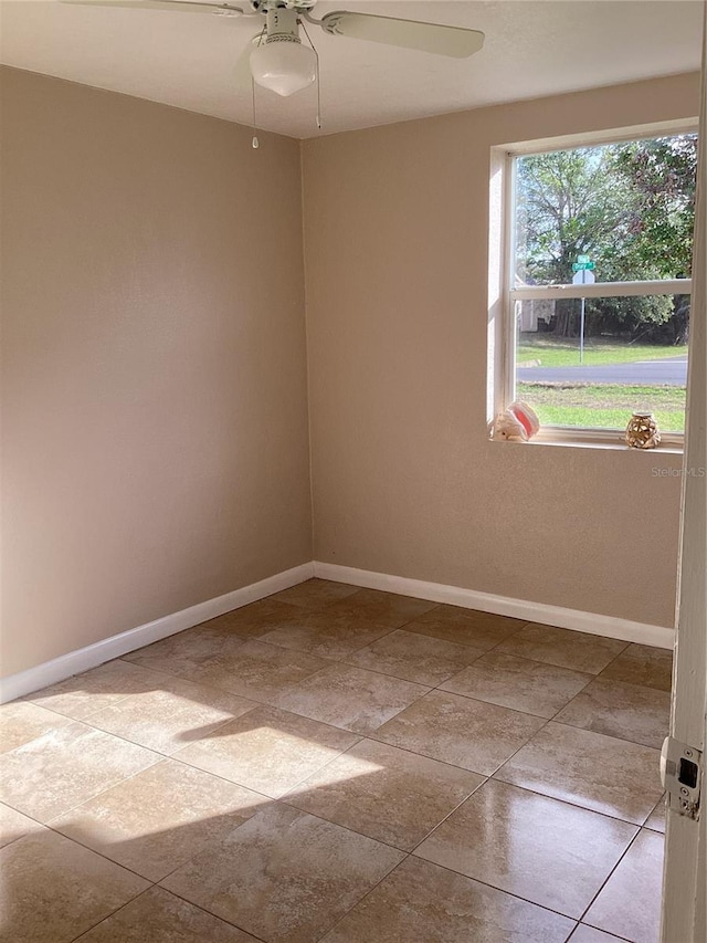 spare room featuring ceiling fan