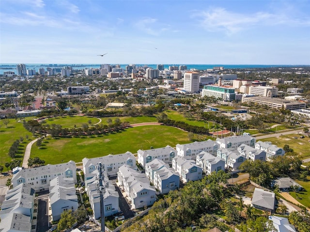 birds eye view of property featuring a city view