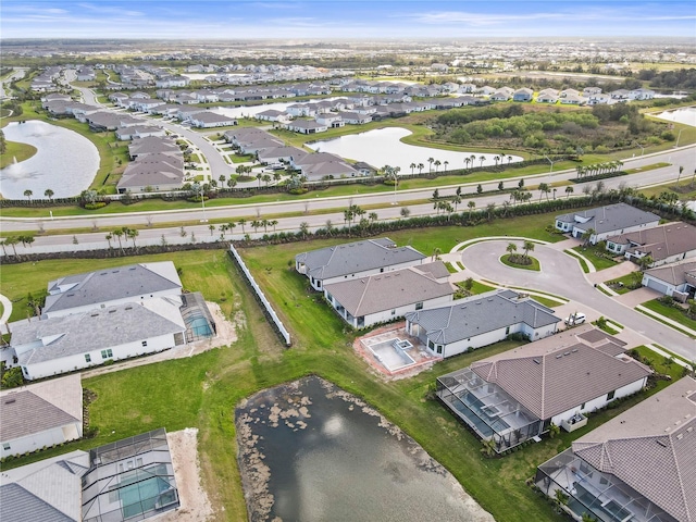 aerial view featuring a water view and a residential view