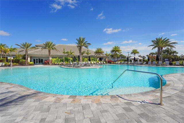 community pool featuring a gazebo and a patio area