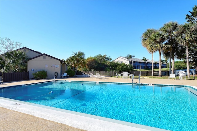 view of pool featuring a patio