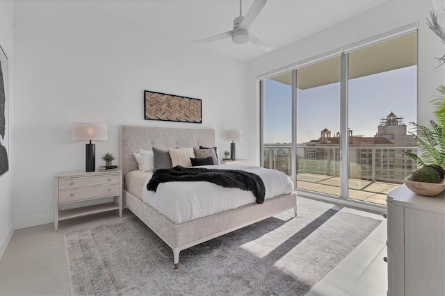 tiled bedroom featuring access to outside and ceiling fan