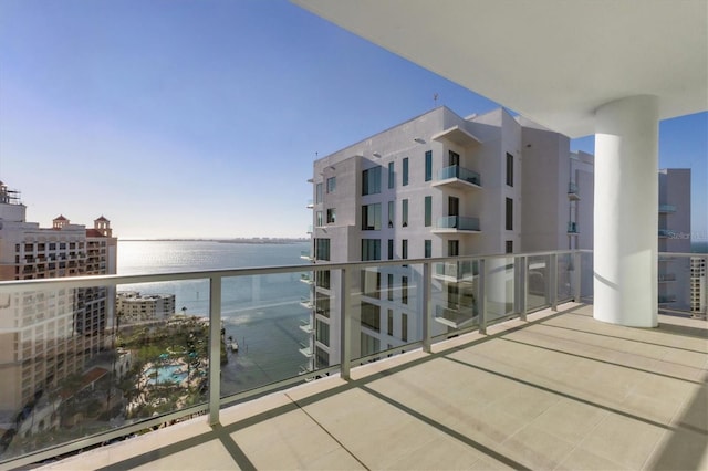 balcony featuring a water view