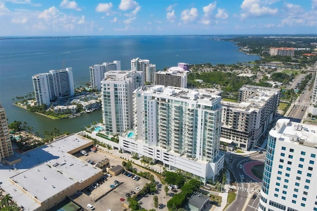 birds eye view of property featuring a water view