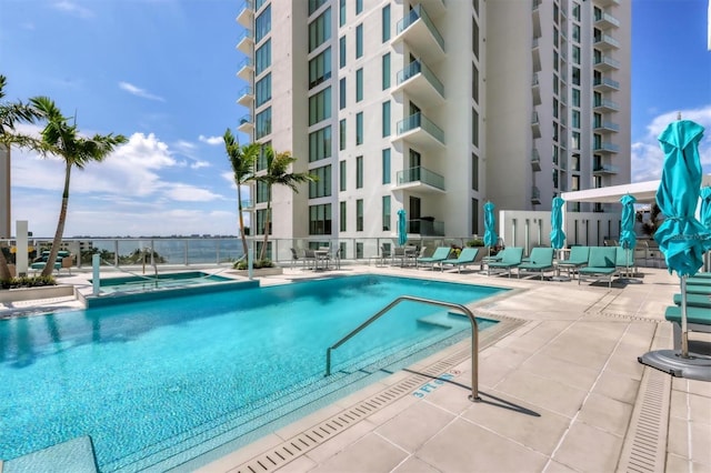 view of swimming pool with a patio area