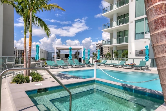 view of swimming pool featuring a patio