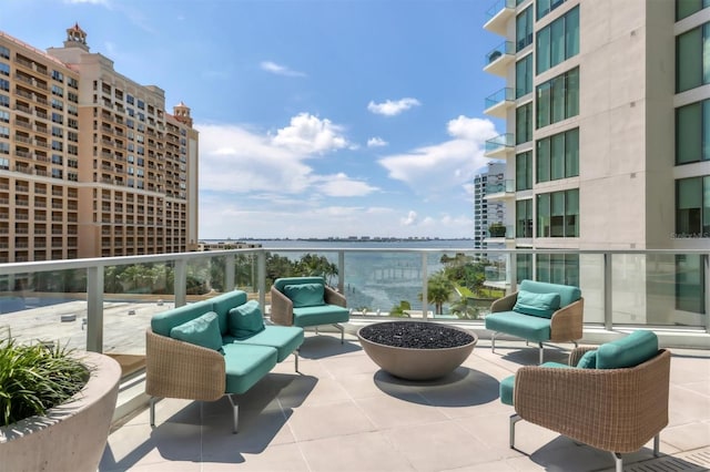 view of patio featuring a balcony