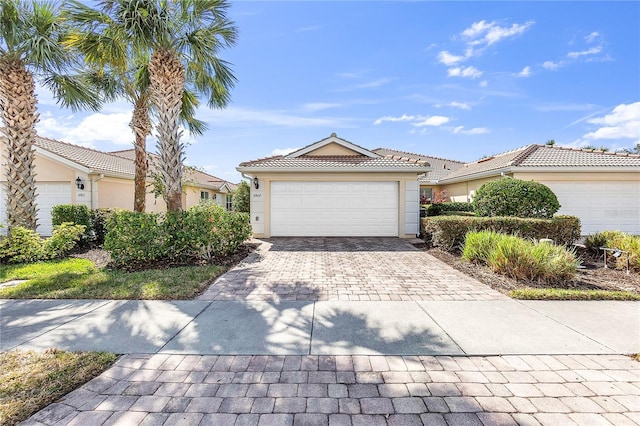 view of front of property with a garage