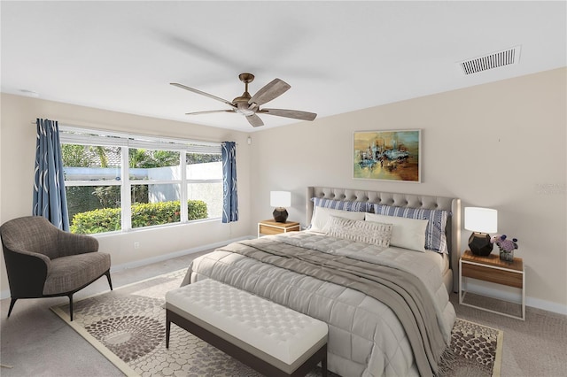 bedroom with ceiling fan and carpet flooring