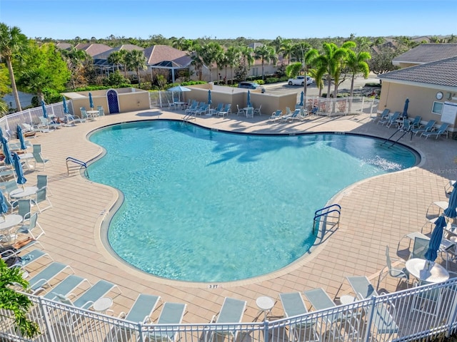 view of swimming pool featuring a patio area