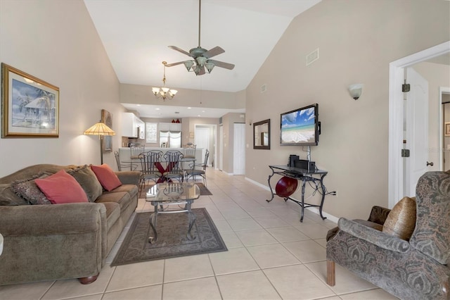 living room with light tile patterned floors, a ceiling fan, baseboards, visible vents, and high vaulted ceiling