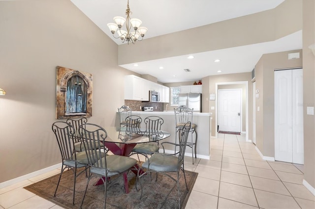 dining room featuring light tile patterned floors, baseboards, an inviting chandelier, recessed lighting, and vaulted ceiling