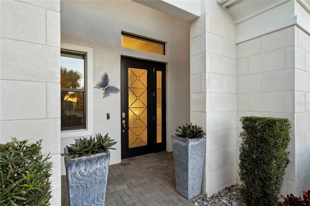 5074 Surfside Cir, Bradenton, FL 34211 - doorway to property with stucco siding