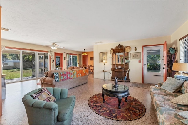 living room featuring a textured ceiling