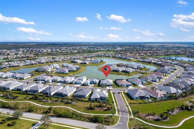 aerial view featuring a water view and a residential view