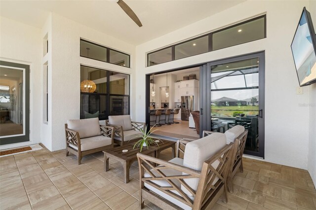 view of patio / terrace with a ceiling fan