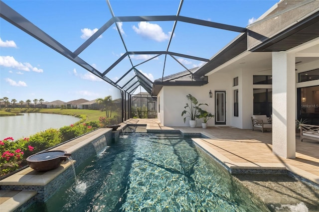 pool featuring a patio, a water view, and glass enclosure