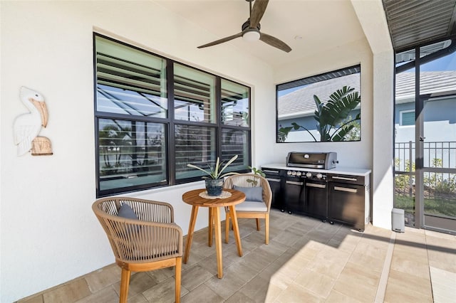 sunroom / solarium with ceiling fan