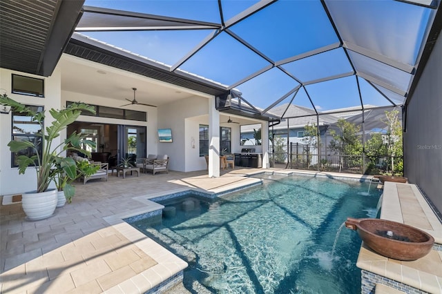 outdoor pool with a patio, glass enclosure, and a ceiling fan