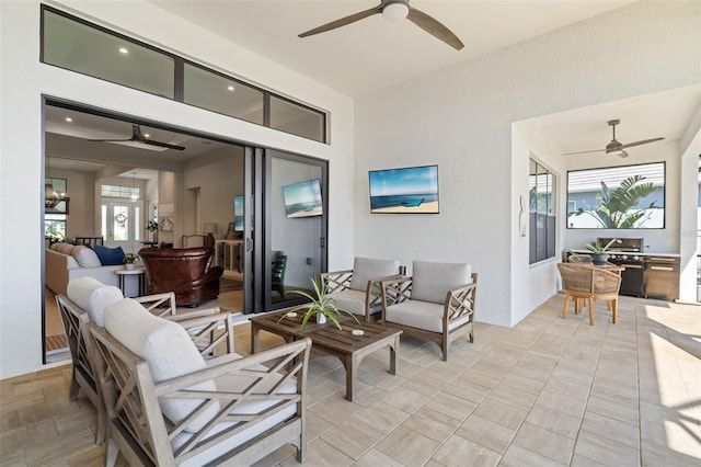 view of patio / terrace featuring outdoor lounge area and ceiling fan