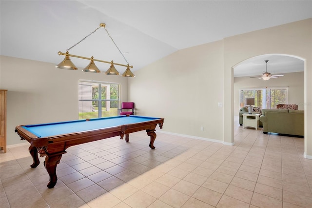 game room featuring light tile patterned flooring, ceiling fan, and vaulted ceiling