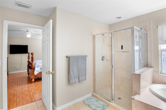 bathroom featuring ceiling fan, independent shower and bath, and tile patterned flooring