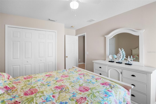 bedroom with ceiling fan and a closet