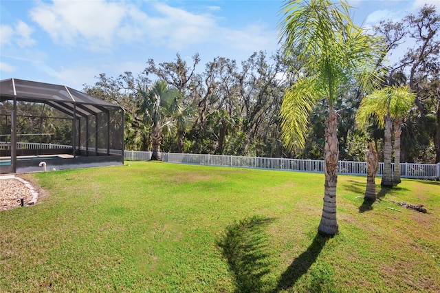 view of yard featuring a lanai