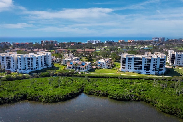 birds eye view of property featuring a water view