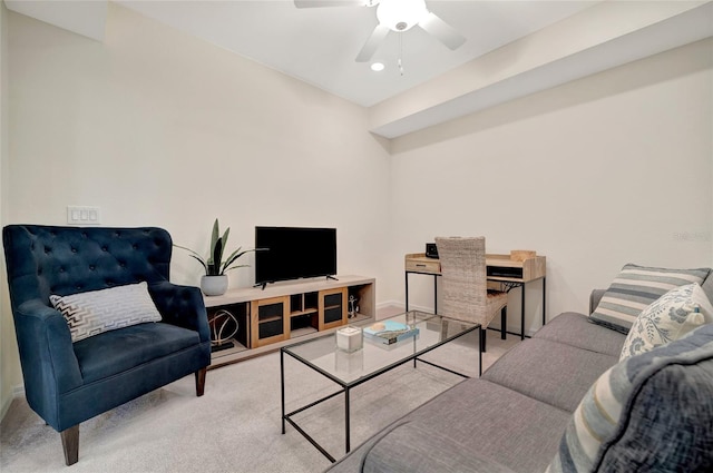 living room featuring ceiling fan and light carpet