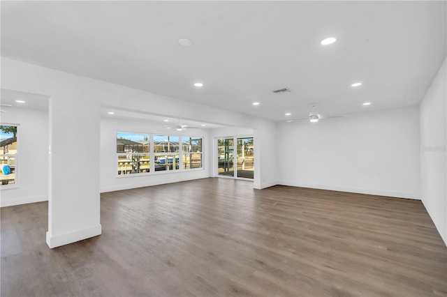 1950 Fairview Dr, Englewood, FL 34223 - unfurnished living room featuring ceiling fan and dark hardwood / wood-style floors