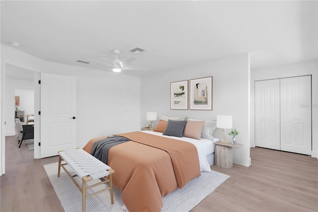 1950 Fairview Dr, Englewood, FL 34223 - bedroom featuring light wood-type flooring, a closet, and ceiling fan