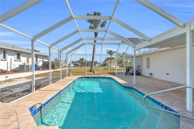 1950 Fairview Dr, Englewood, FL 34223 - view of pool featuring a patio, central AC, and a lanai