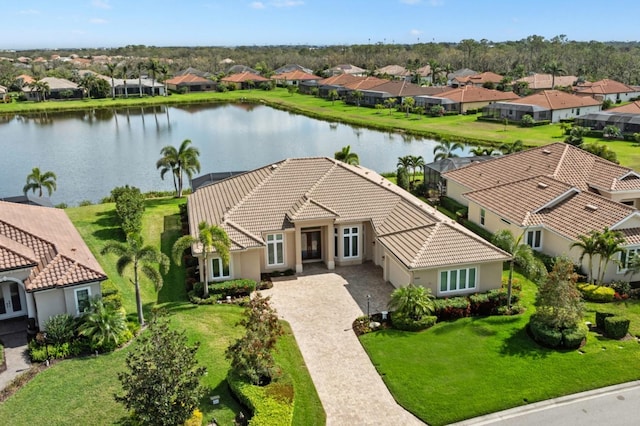 aerial view featuring a water view and a residential view