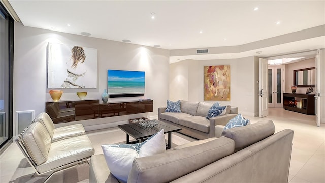 living room with light tile patterned floors