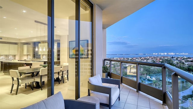 balcony at dusk with a water view