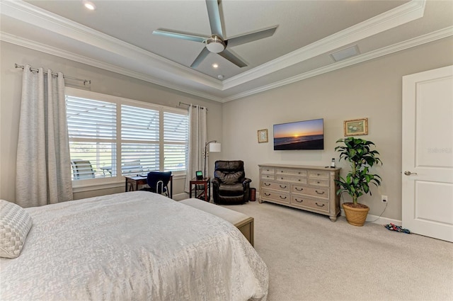 bedroom featuring recessed lighting, a tray ceiling, crown molding, a ceiling fan, and carpet floors