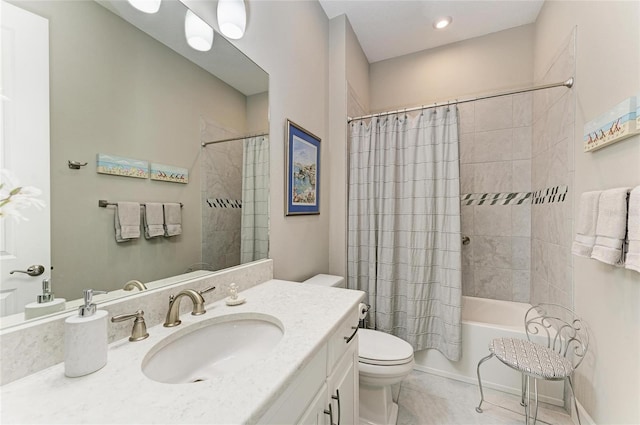full bath with tile patterned floors, shower / bath combination with curtain, toilet, and vanity