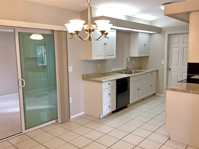 kitchen with pendant lighting, black dishwasher, sink, and white cabinets