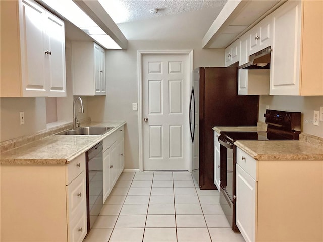 kitchen featuring sink, light tile patterned floors, dishwasher, white cabinetry, and range with electric stovetop