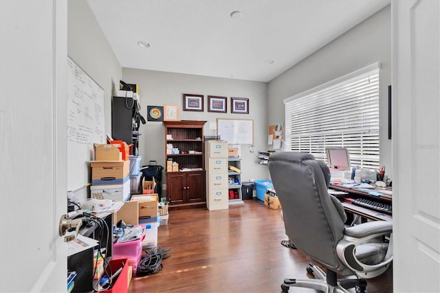 home office with wood-type flooring