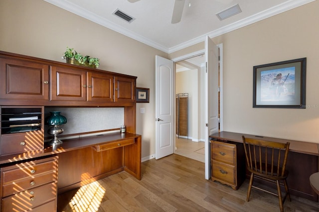 office space featuring crown molding, ceiling fan, and light hardwood / wood-style floors