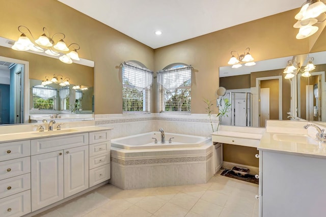 bathroom featuring tile patterned flooring, vanity, and independent shower and bath