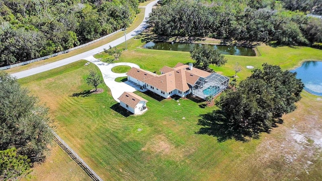 drone / aerial view with a water view