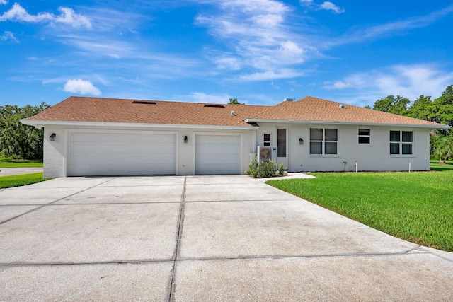 5750 Saddle Oak Trl, Sarasota, FL 34241 - single story home with an attached garage, concrete driveway, stucco siding, and a front yard