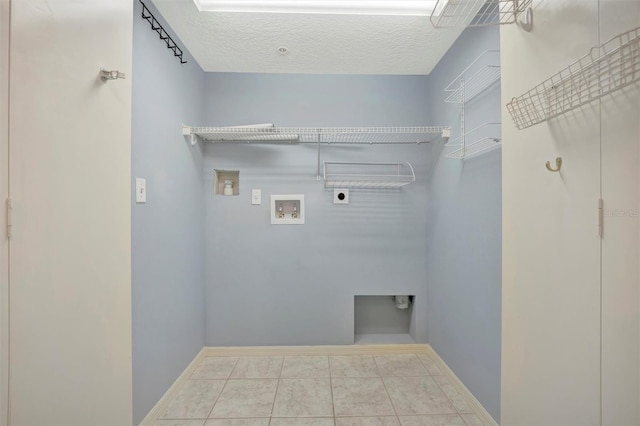 laundry room featuring washer hookup, laundry area, hookup for an electric dryer, and baseboards